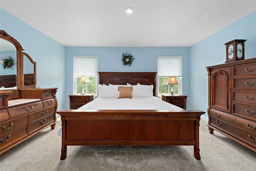 508 Hogan Drive Monroeville, PA 15146 - Photo 18 of 26 a bedroom with a bed and furniture