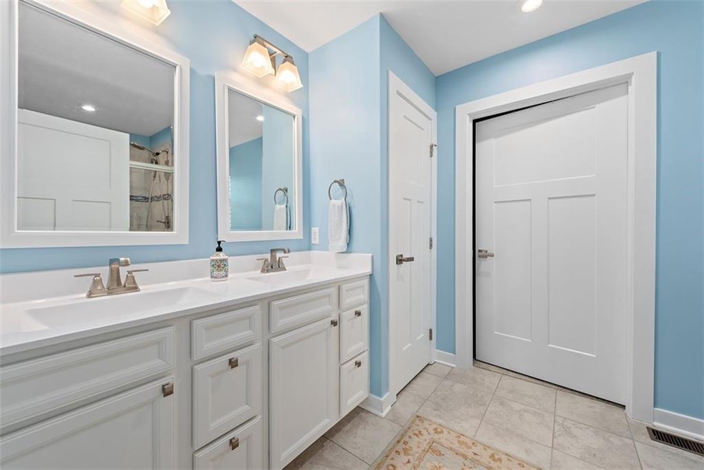 508 Hogan Drive Monroeville, PA 15146 - Photo 19 of 26 a spacious bathroom with a double vanity sink mirror and