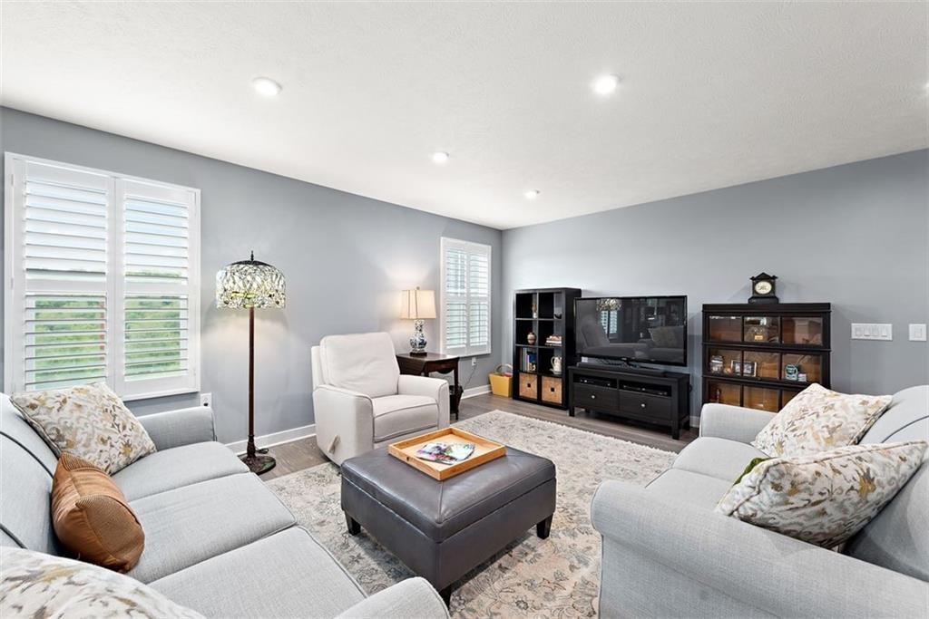 508 Hogan Drive Monroeville, PA 15146 - Photo 2 of 26 a living room with furniture and a flat screen tv