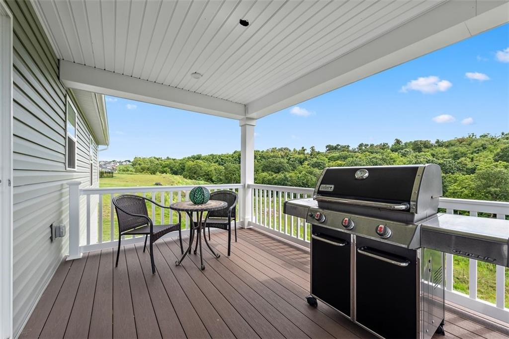 508 Hogan Drive Monroeville, PA 15146 - Photo 23 of 26 a view of a chairs and table on the wooden deck