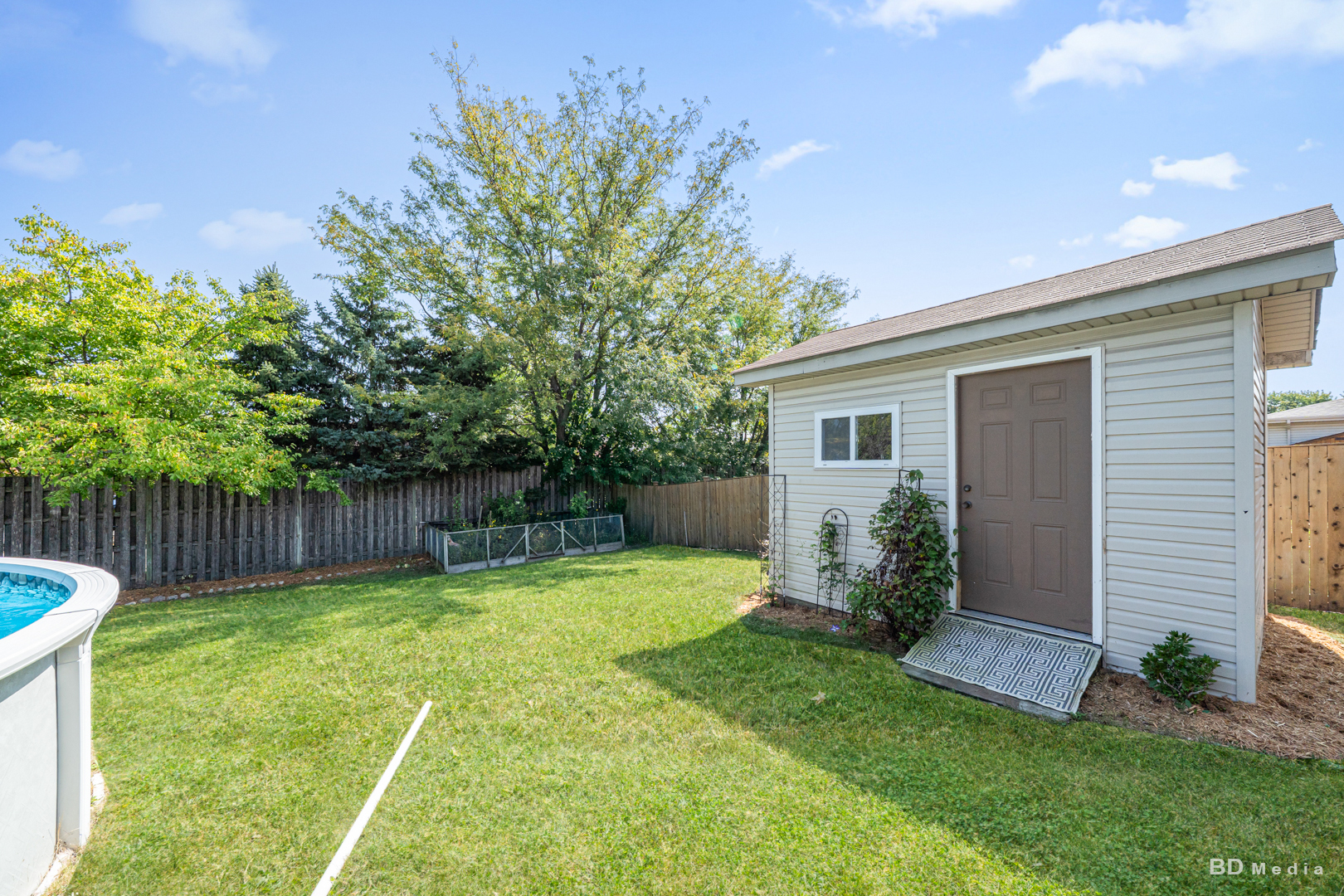 2018 Olde Mill Road Plainfield, IL 60586 - Photo 27 of 30 a view of a backyard with a garden