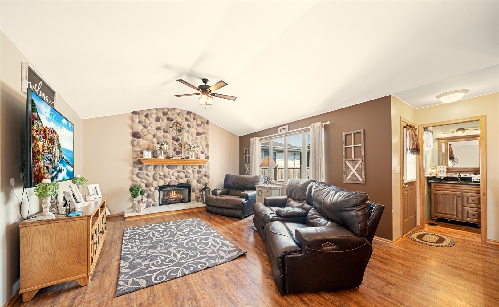 2018 Olde Mill Road Plainfield, IL 60586 - Photo 5 of 30 a living room with furniture and a fireplace