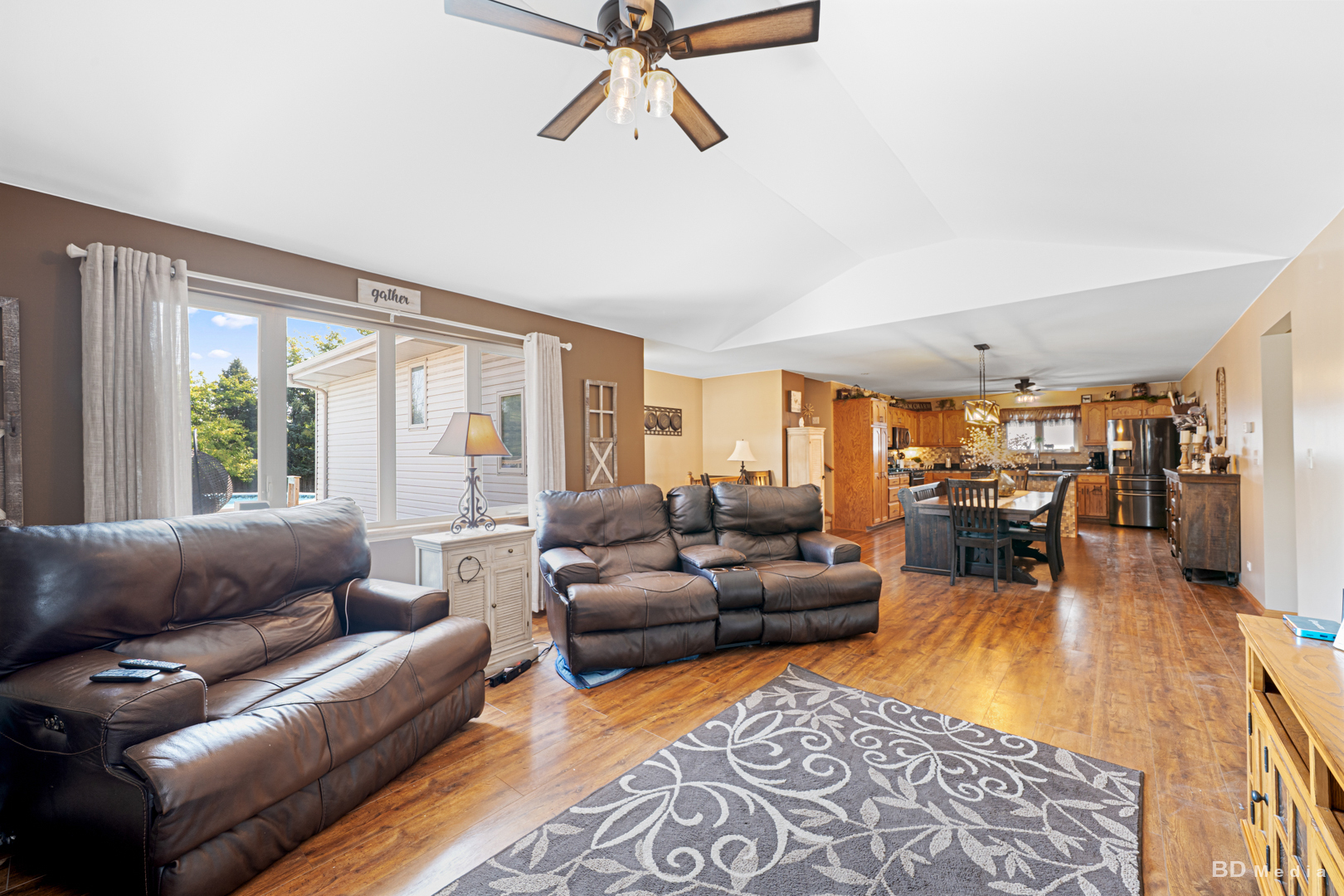 2018 Olde Mill Road Plainfield, IL 60586 - Photo 6 of 30 a living room with furniture and a large window