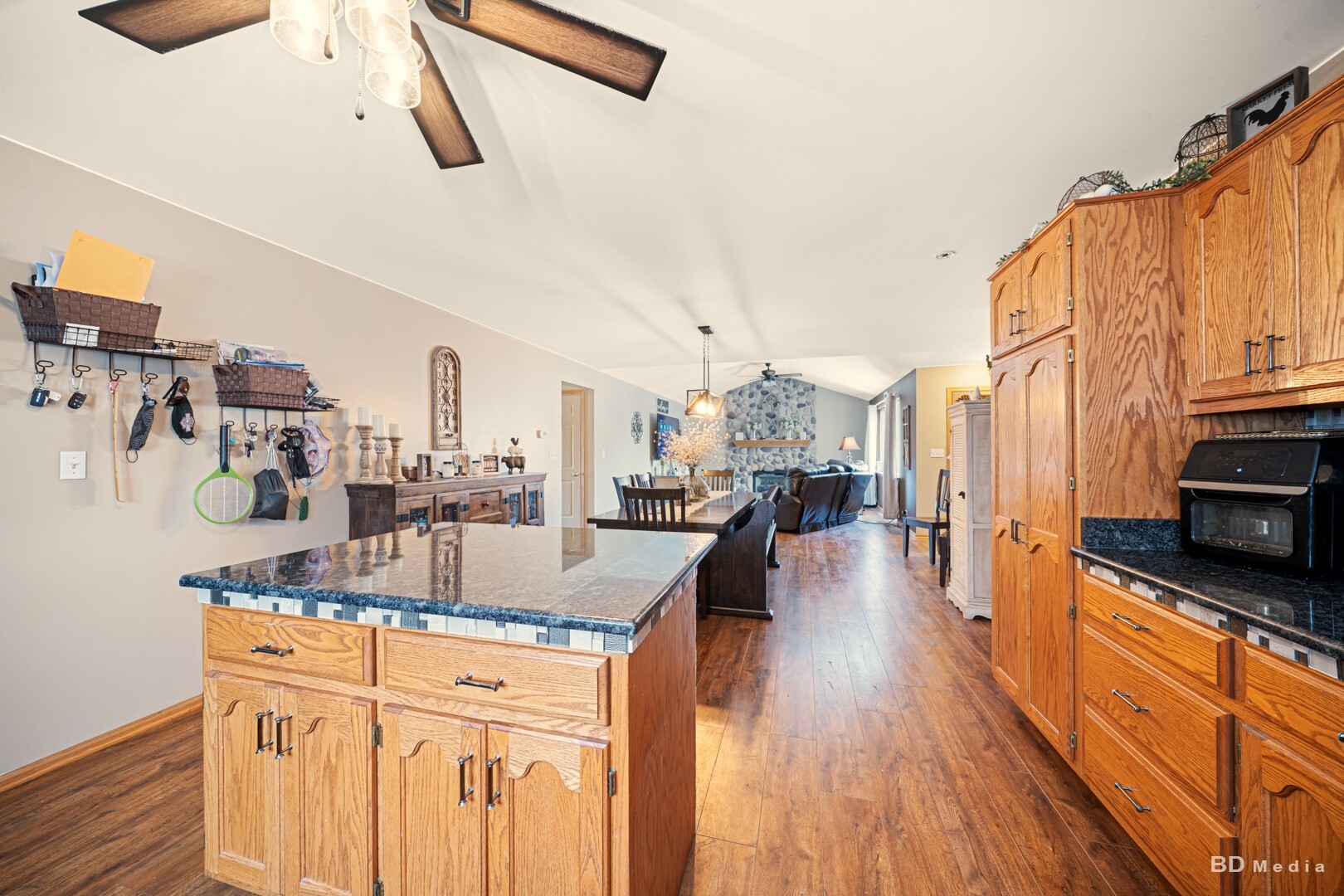 2018 Olde Mill Road Plainfield, IL 60586 - Photo 8 of 30 a kitchen with stainless steel appliances granite countertop a lot of counter space and wooden floors