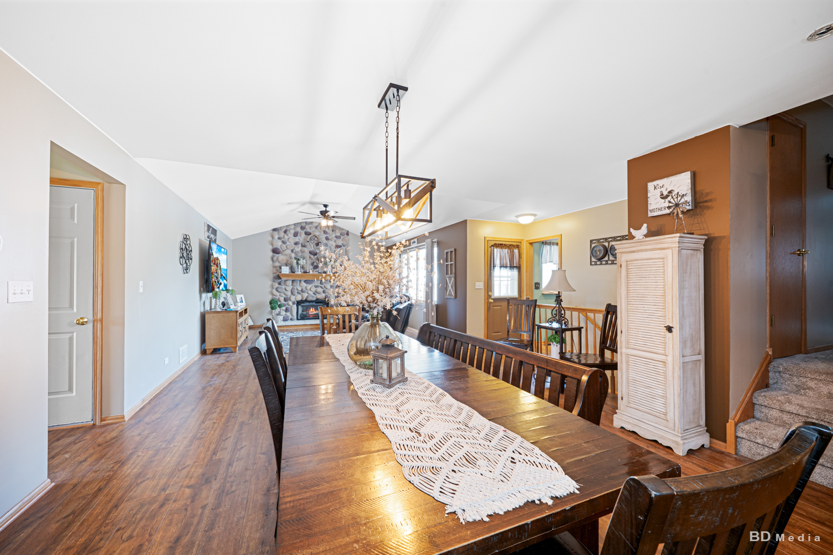 2018 Olde Mill Road Plainfield, IL 60586 - Photo 10 of 30 a view of a dining room with furniture window and wooden floor