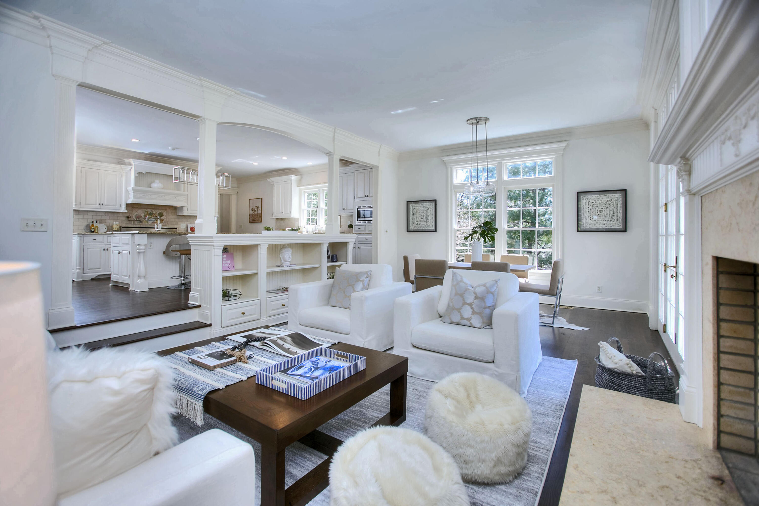 320 Ponus Ridge Road New Canaan, CT 06840 - Photo 19 of 40 a living room with furniture and a table