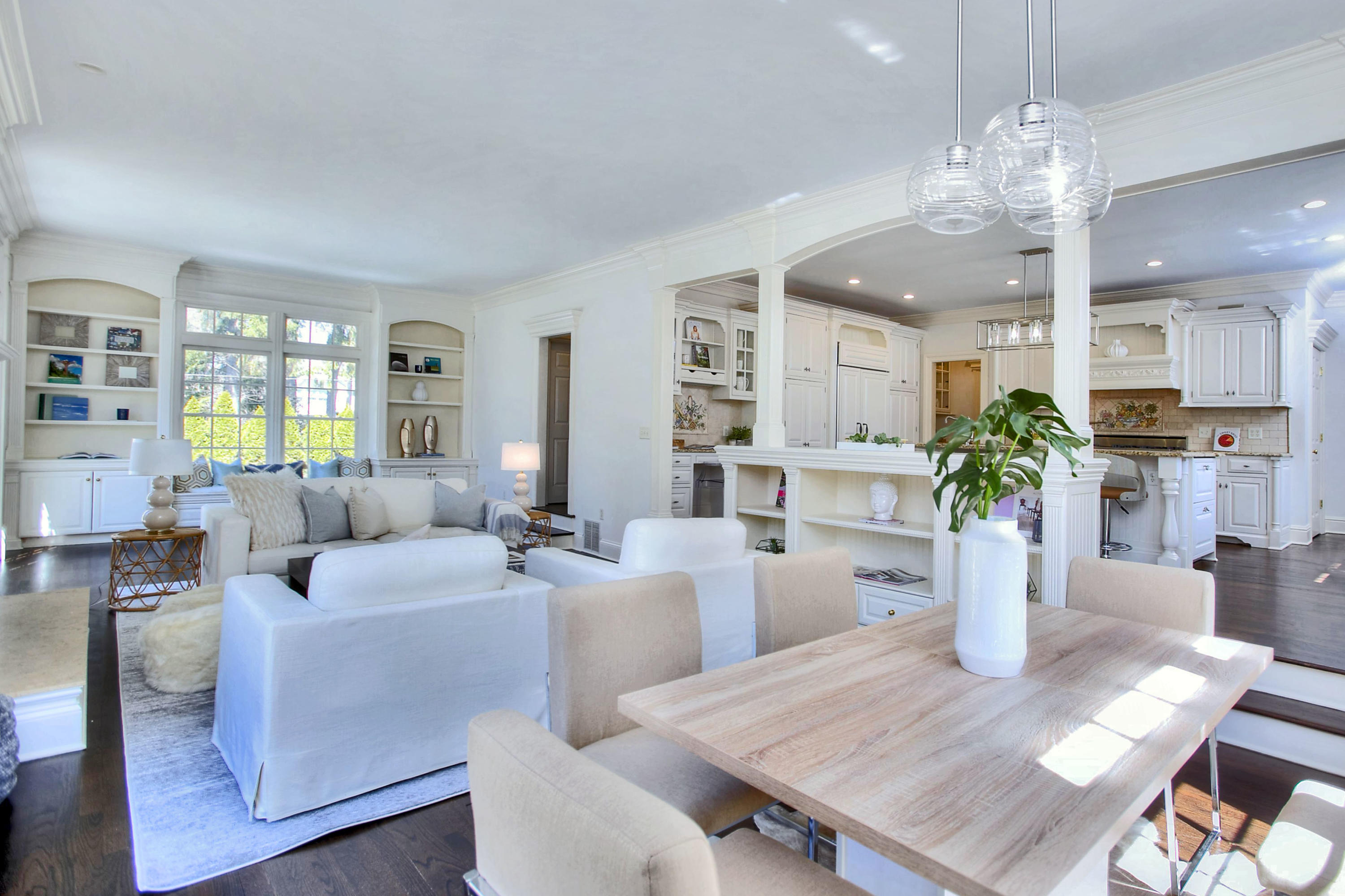 320 Ponus Ridge Road New Canaan, CT 06840 - Photo 21 of 40 a living room with fireplace furniture and a chandelier