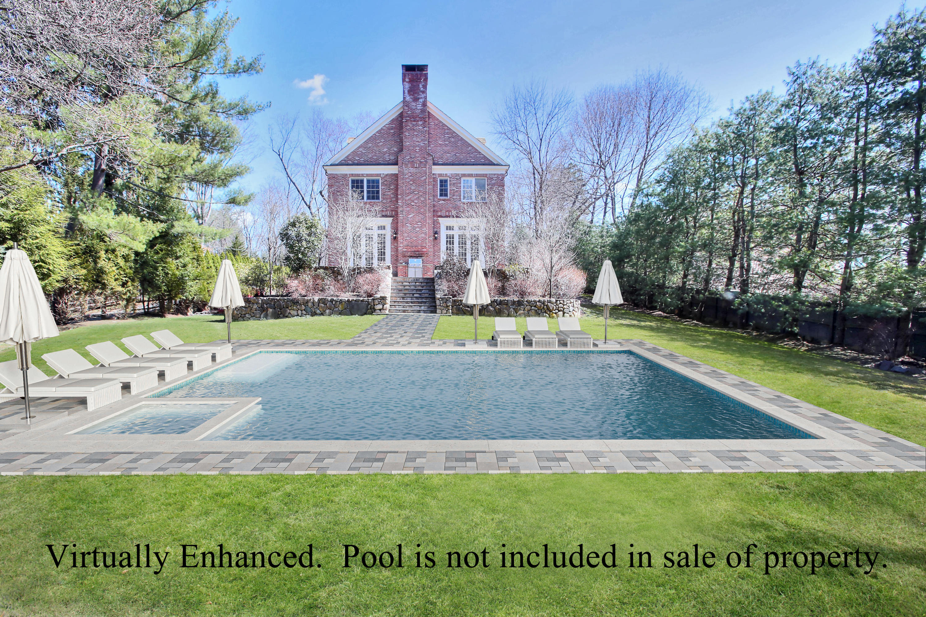 320 Ponus Ridge Road New Canaan, CT 06840 - Photo 34 of 40 a view of a house with a swimming pool