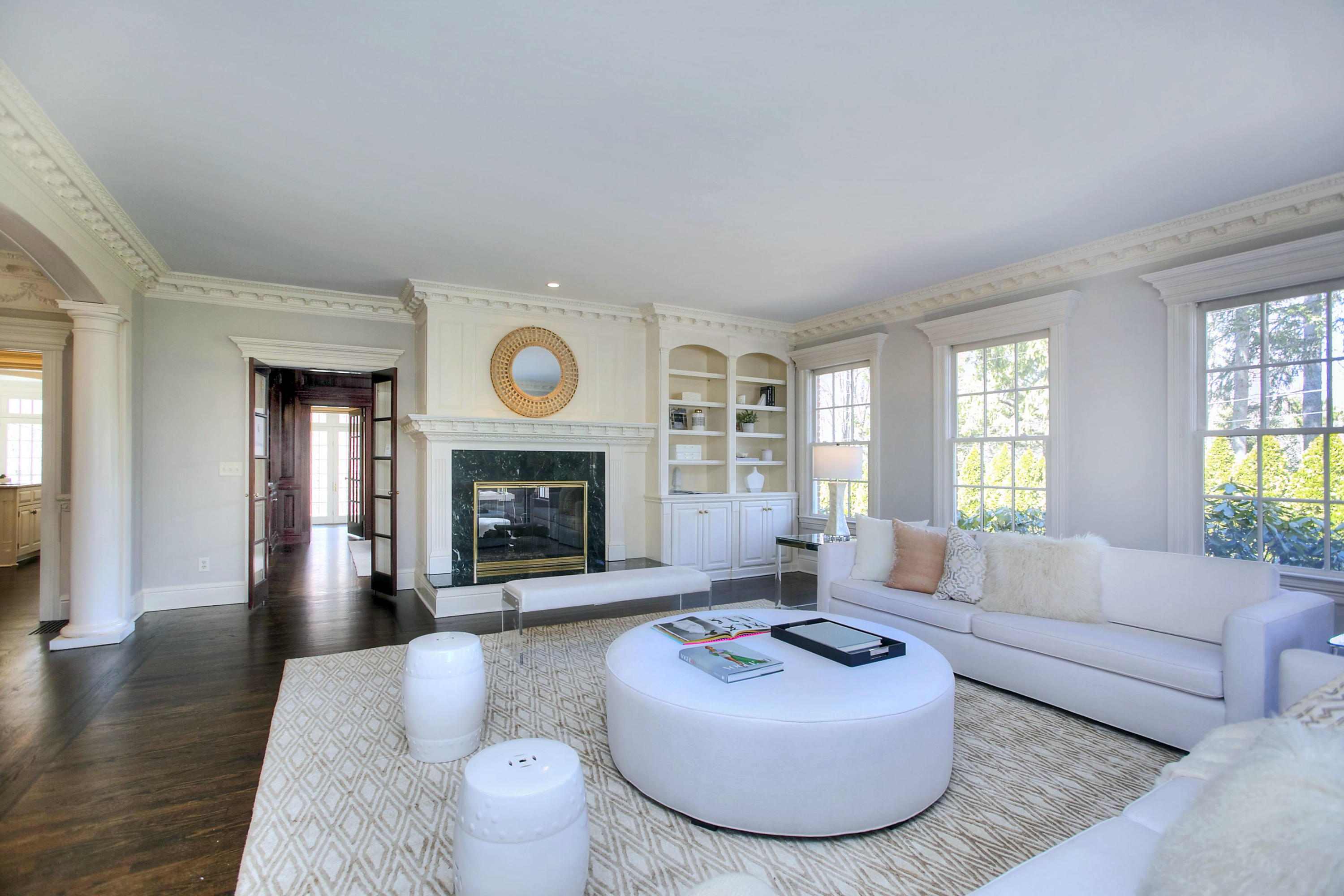 320 Ponus Ridge Road New Canaan, CT 06840 - Photo 6 of 40 a living room with furniture and a fireplace