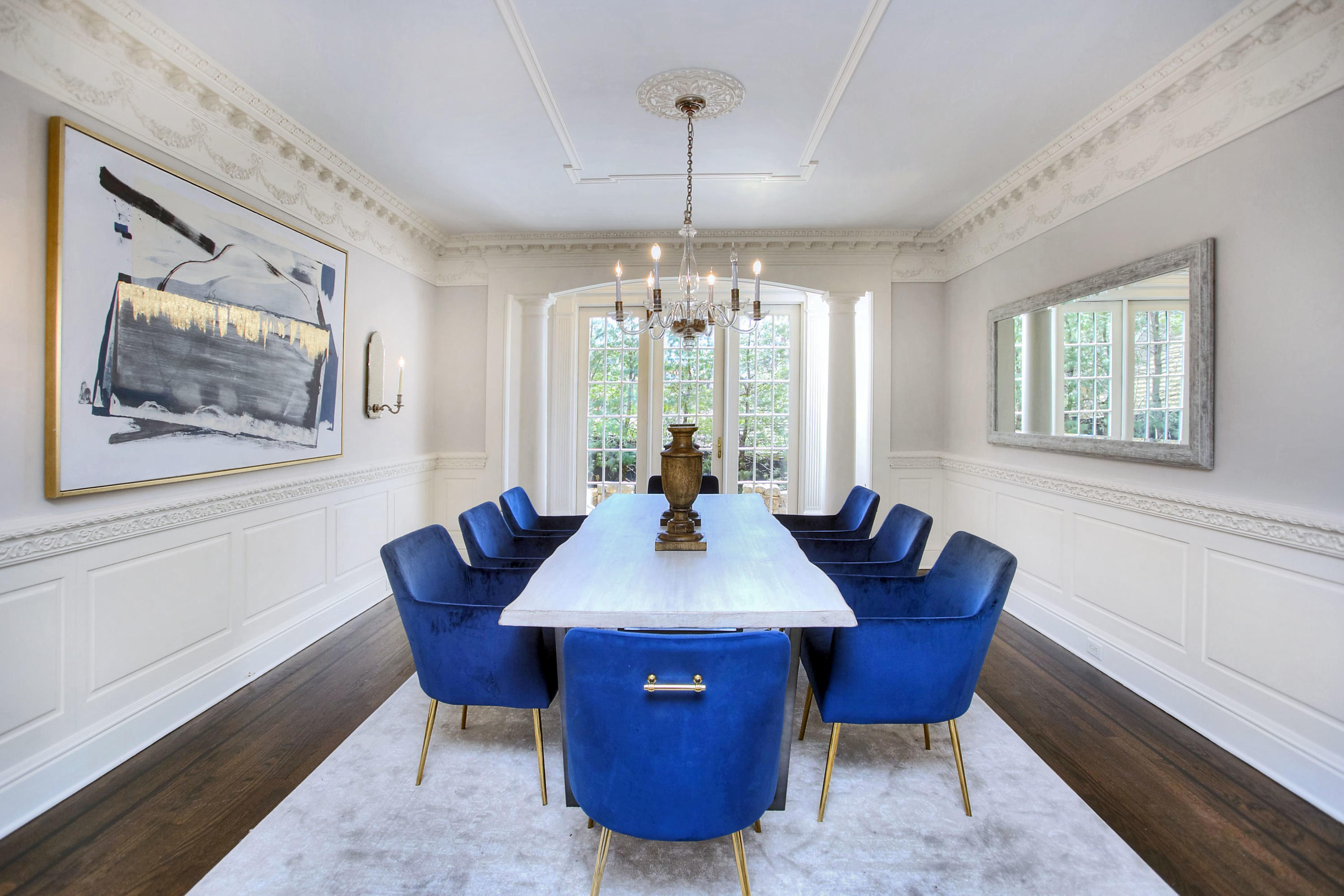 320 Ponus Ridge Road New Canaan, CT 06840 - Photo 8 of 40 a view of a dining room with furniture window and wooden floor