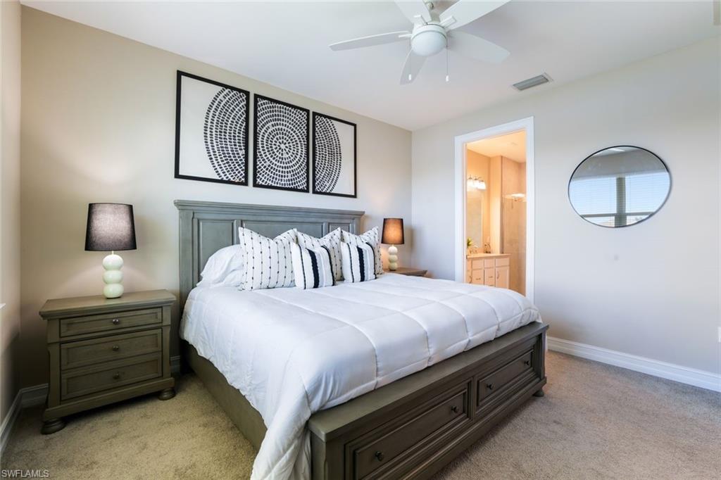 1116 Rolling Brook Lane Naples, FL 34114 - Photo 11 of 22 a bedroom with a bed and window