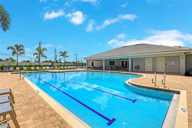 a view of a house with swimming pool