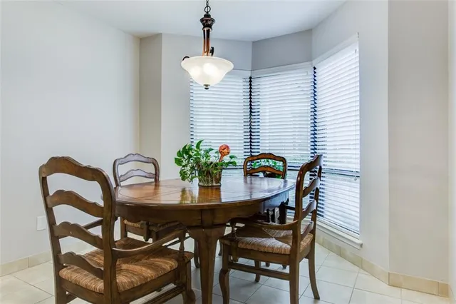 a kitchen with stainless steel appliances granite countertop a sink and a stove