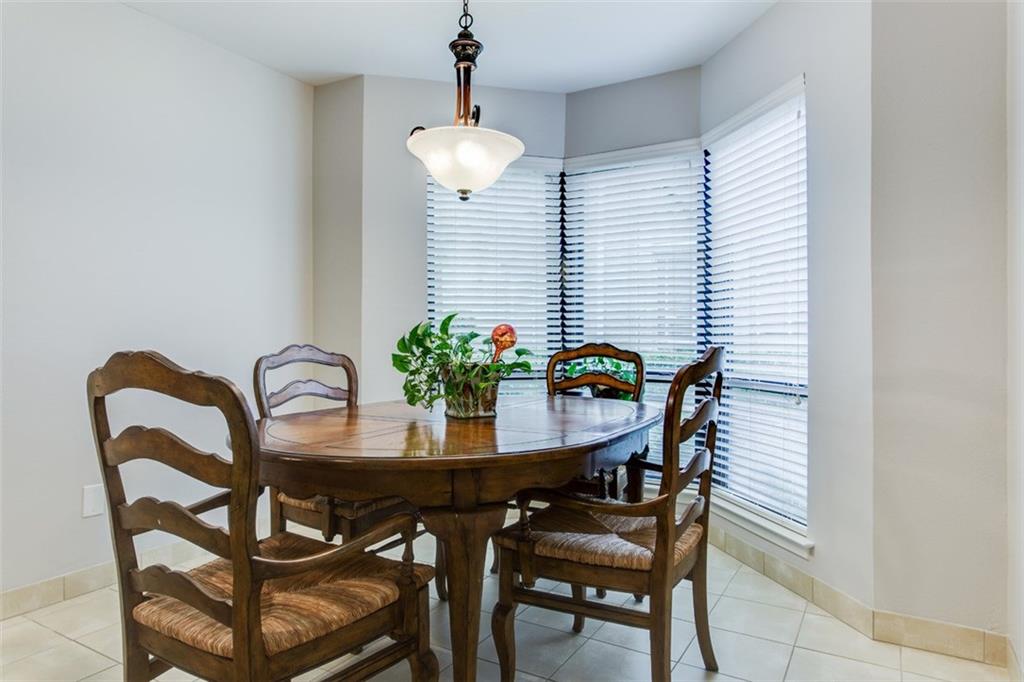 6357 Diamond Head Circle, Unit B Dallas, TX 75225 - Photo 12 of 23 Eat-in Breakfast area with windows viewing back yard between bldgs