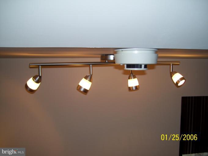 9240 Piscataway Road Clinton, MD 20735 - Photo 8 of 30 Family Room lights at bottom of steps