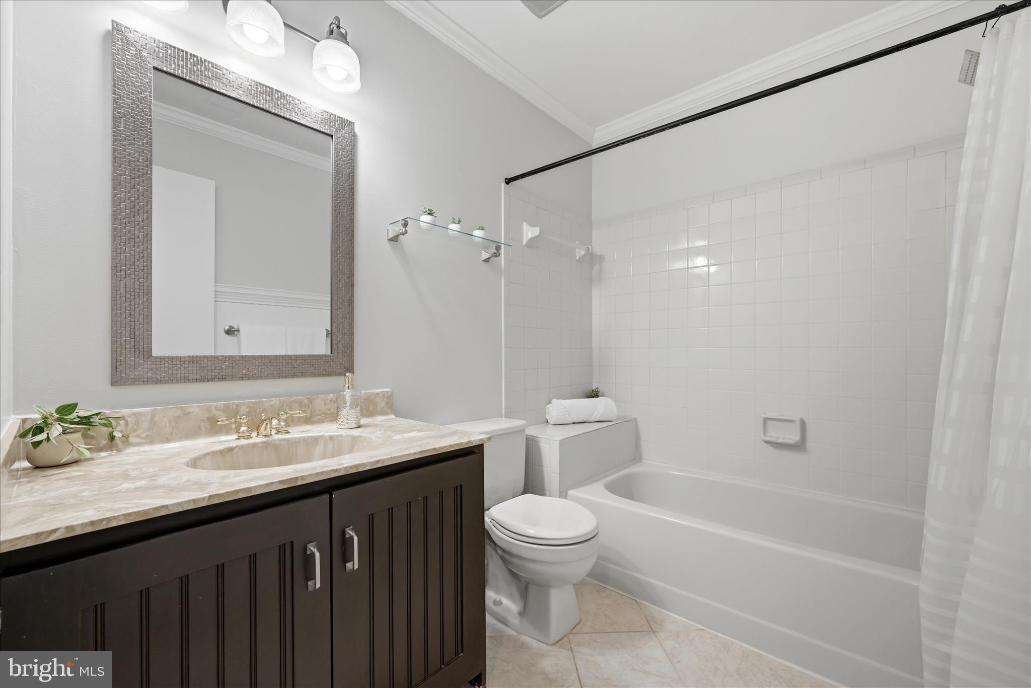 1907 Villaridge Drive Reston, VA 20191 - Photo 18 of 32 a bathroom with a granite countertop sink mirror toilet and bathtub