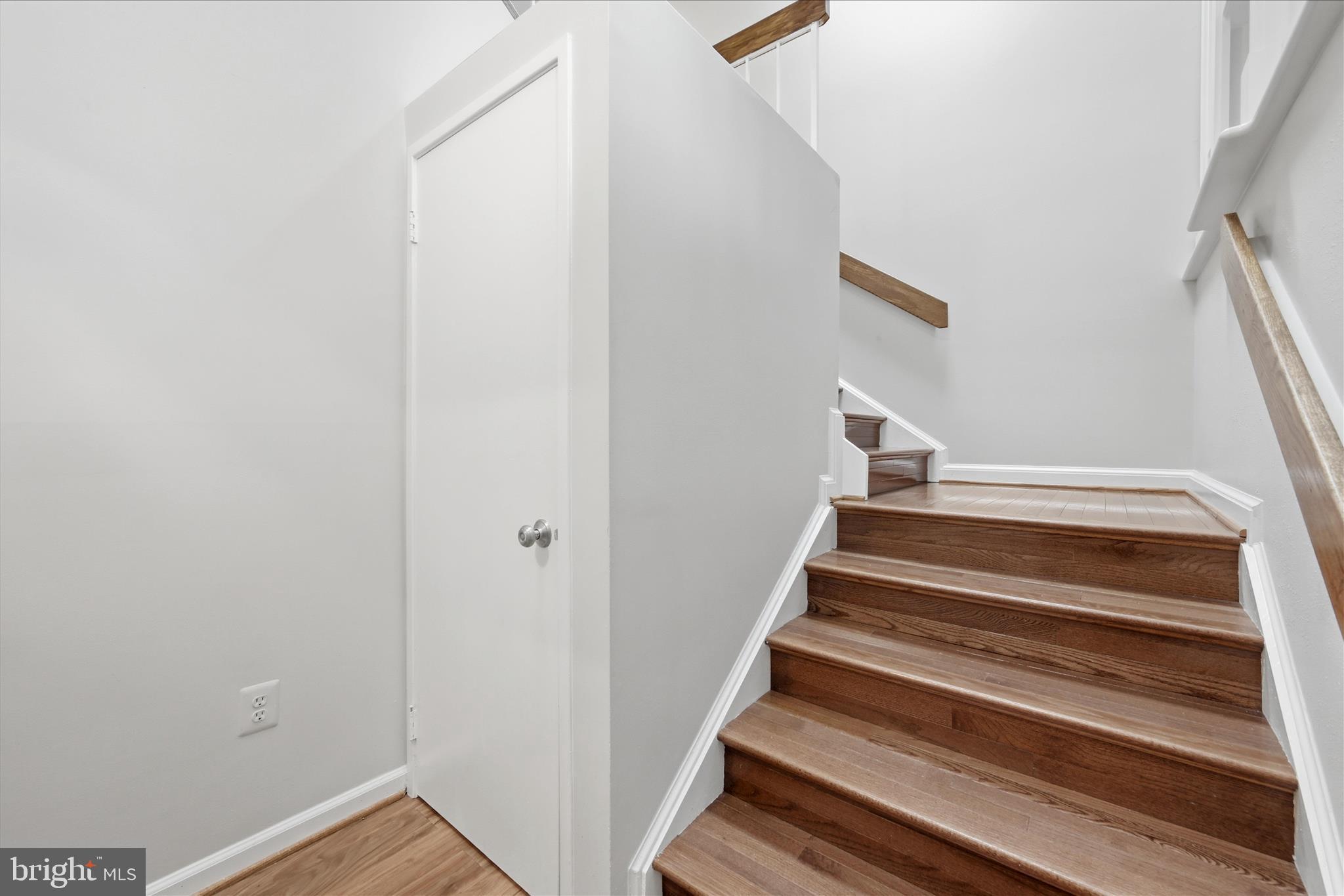 1907 Villaridge Drive Reston, VA 20191 - Photo 24 of 32 a view of staircase with white walls and white door