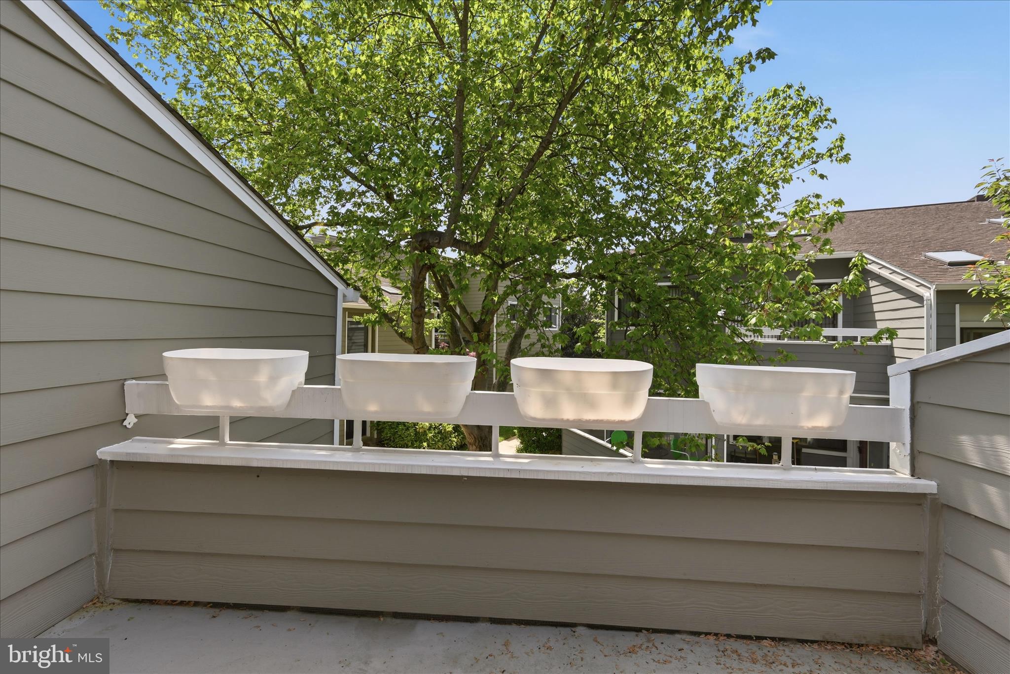 1907 Villaridge Drive Reston, VA 20191 - Photo 26 of 32 a view of building with roof deck and seating space