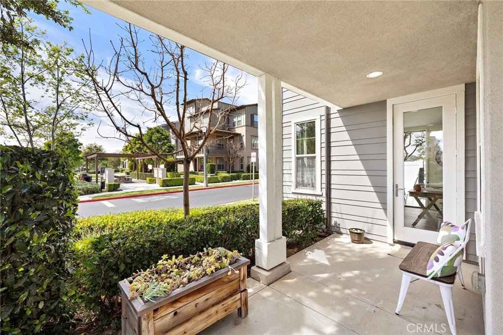 26 Yerra Street Rancho Mission Viejo, CA 92694 - Photo 19 of 75 Wraparound side porch offering another inviting area to enjoy views of one of the parks.