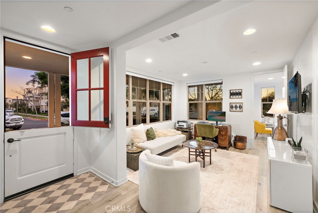 26 Yerra Street Rancho Mission Viejo, CA 92694 - Photo 20 of 75 a living room with furniture and large window