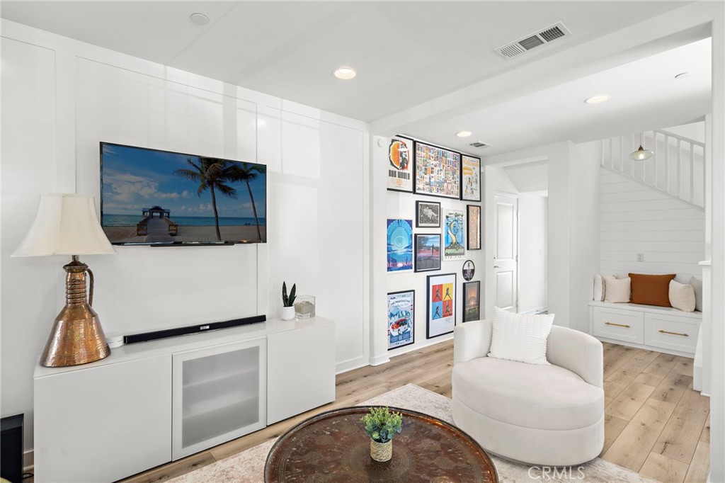 26 Yerra Street Rancho Mission Viejo, CA 92694 - Photo 22 of 75 a living room with furniture and a flat screen tv