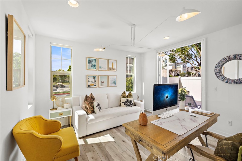 26 Yerra Street Rancho Mission Viejo, CA 92694 - Photo 23 of 75 a living room with furniture and a flat screen tv