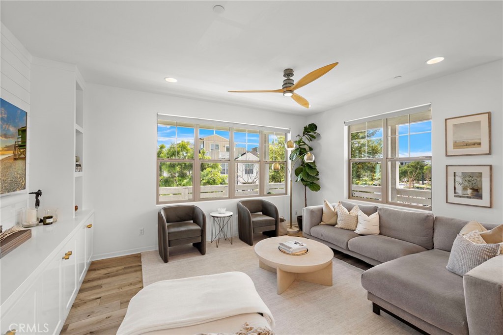 26 Yerra Street Rancho Mission Viejo, CA 92694 - Photo 30 of 75 a living room with furniture and a large window