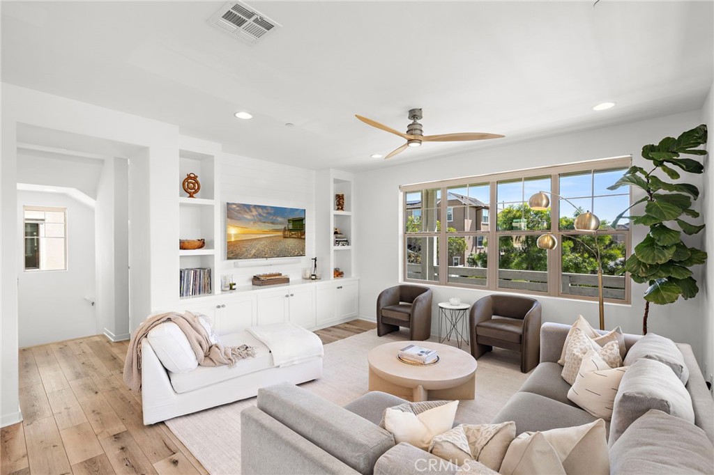 26 Yerra Street Rancho Mission Viejo, CA 92694 - Photo 31 of 75 a living room with furniture and a large window