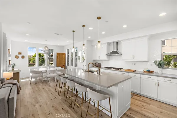 a spacious bedroom with a large bed and a couch