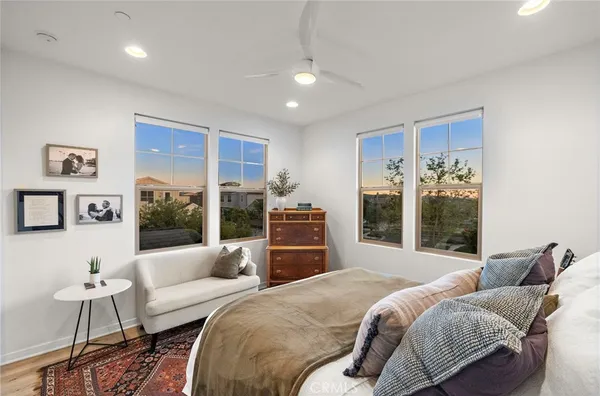 a view of a house with backyard porch and sitting area
