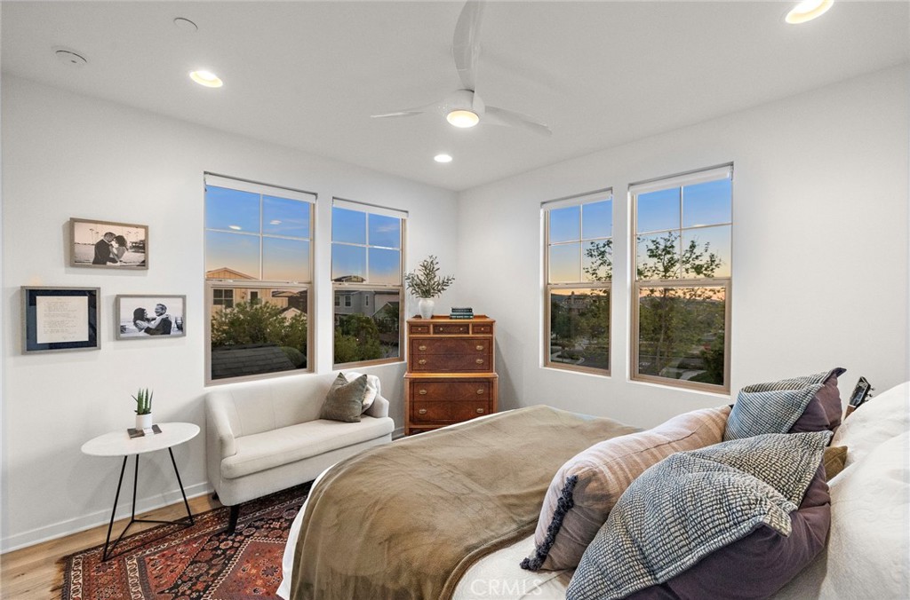 26 Yerra Street Rancho Mission Viejo, CA 92694 - Photo 47 of 75 a spacious bedroom with a large bed and a couch