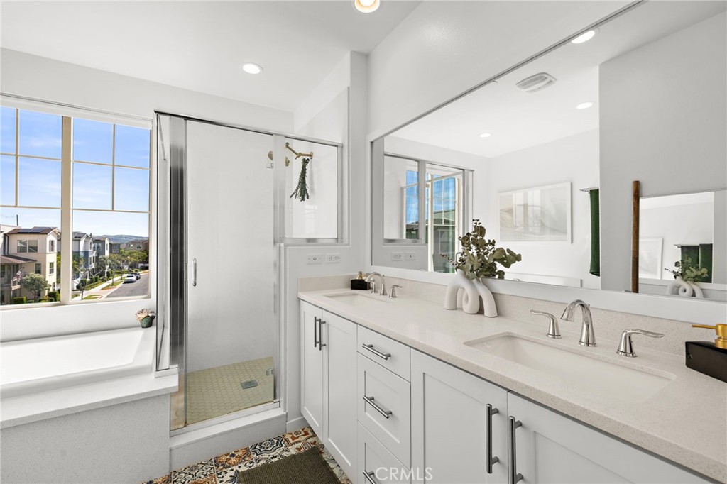 26 Yerra Street Rancho Mission Viejo, CA 92694 - Photo 48 of 75 a bathroom with a double vanity sink mirror and double
