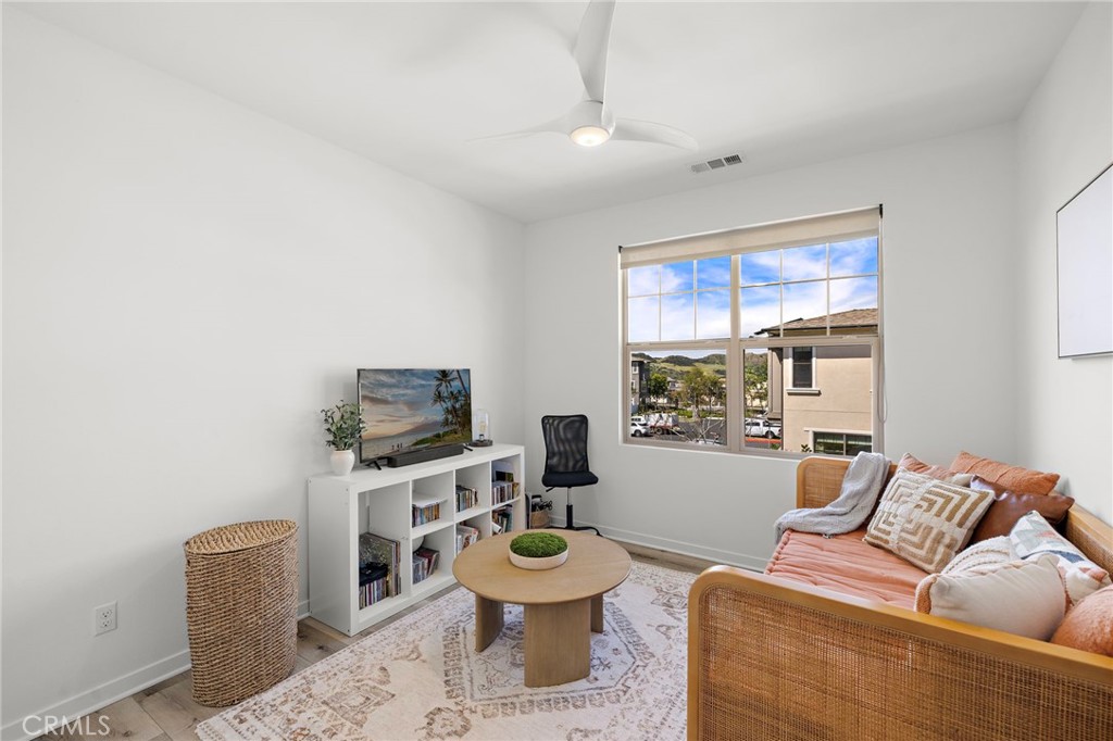 26 Yerra Street Rancho Mission Viejo, CA 92694 - Photo 51 of 75 a living room with furniture and a window