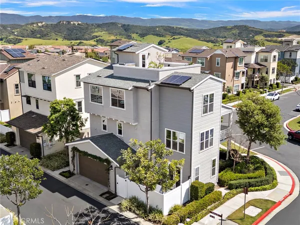 an aerial view of a city with lots of residential buildings