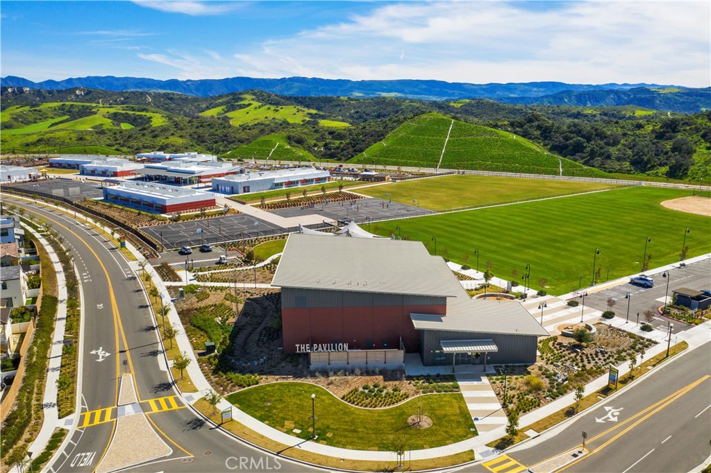 26 Yerra Street Rancho Mission Viejo, CA 92694 - Photo 62 of 75 Community aerial capturing parks, open space, and proximity to a nearby K–8 school.