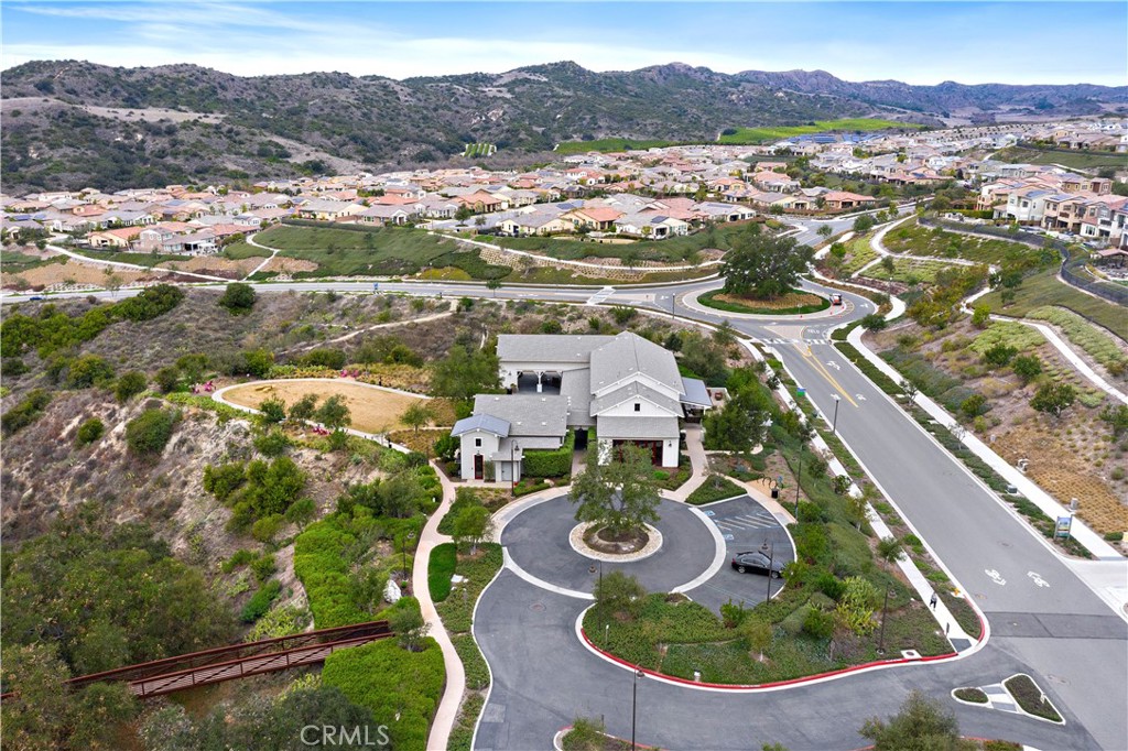 26 Yerra Street Rancho Mission Viejo, CA 92694 - Photo 65 of 75 Community center aerial highlighting neighborhood amenities and natural surroundings.