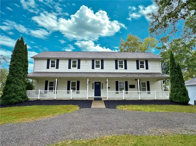 a view of a house with a garden