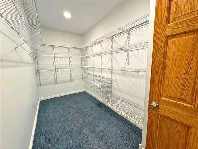 view of a room with racks on the wall