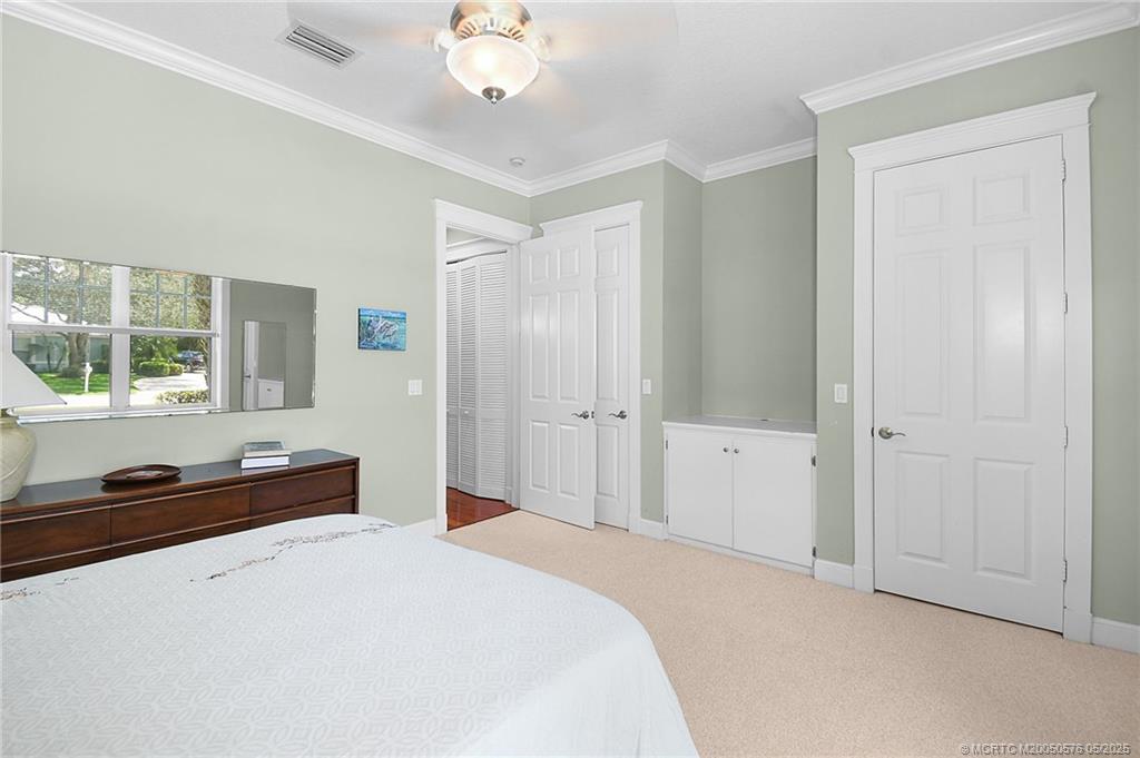 5327 Southeast Reef Way Stuart, FL 34997 - Photo 25 of 39 Guest bedroom closets and built-in