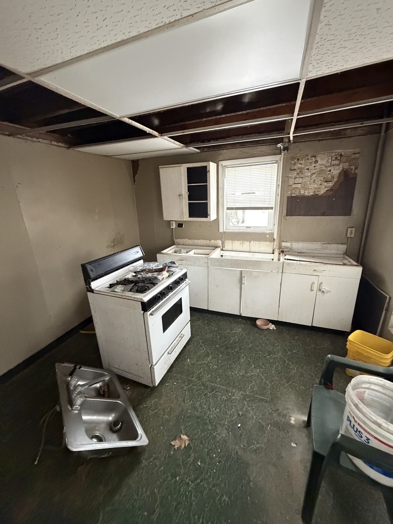 439 5th Avenue Moline, IL 61265 - Photo 12 of 16 a room with storage and utility