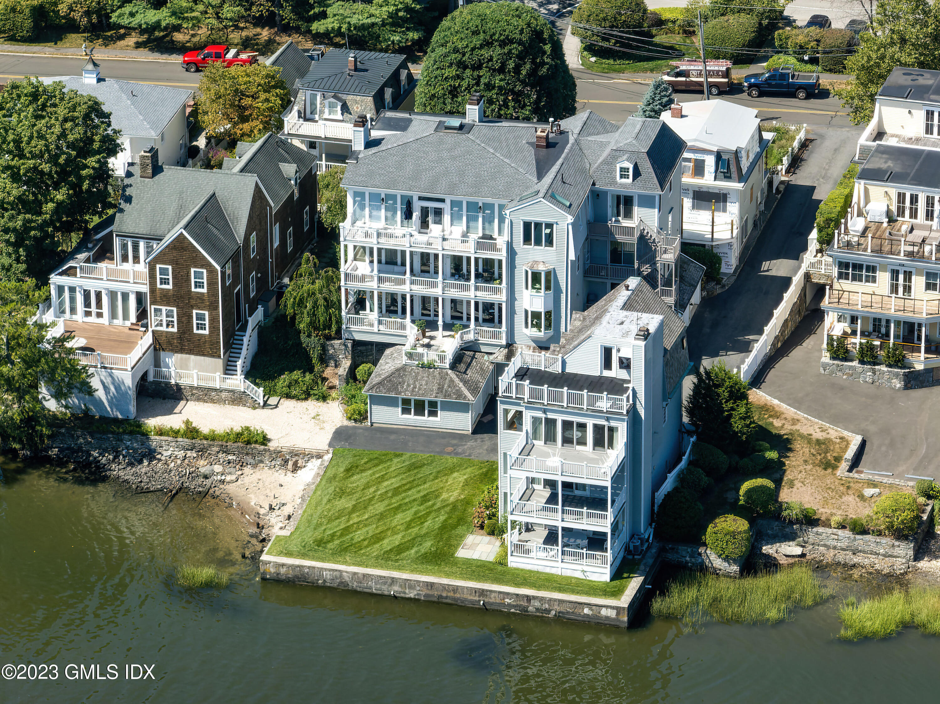 633 Steamboat Road, Unit 2 Greenwich, CT 06830 - Photo 1 of 27 an aerial view of multiple houses with yard