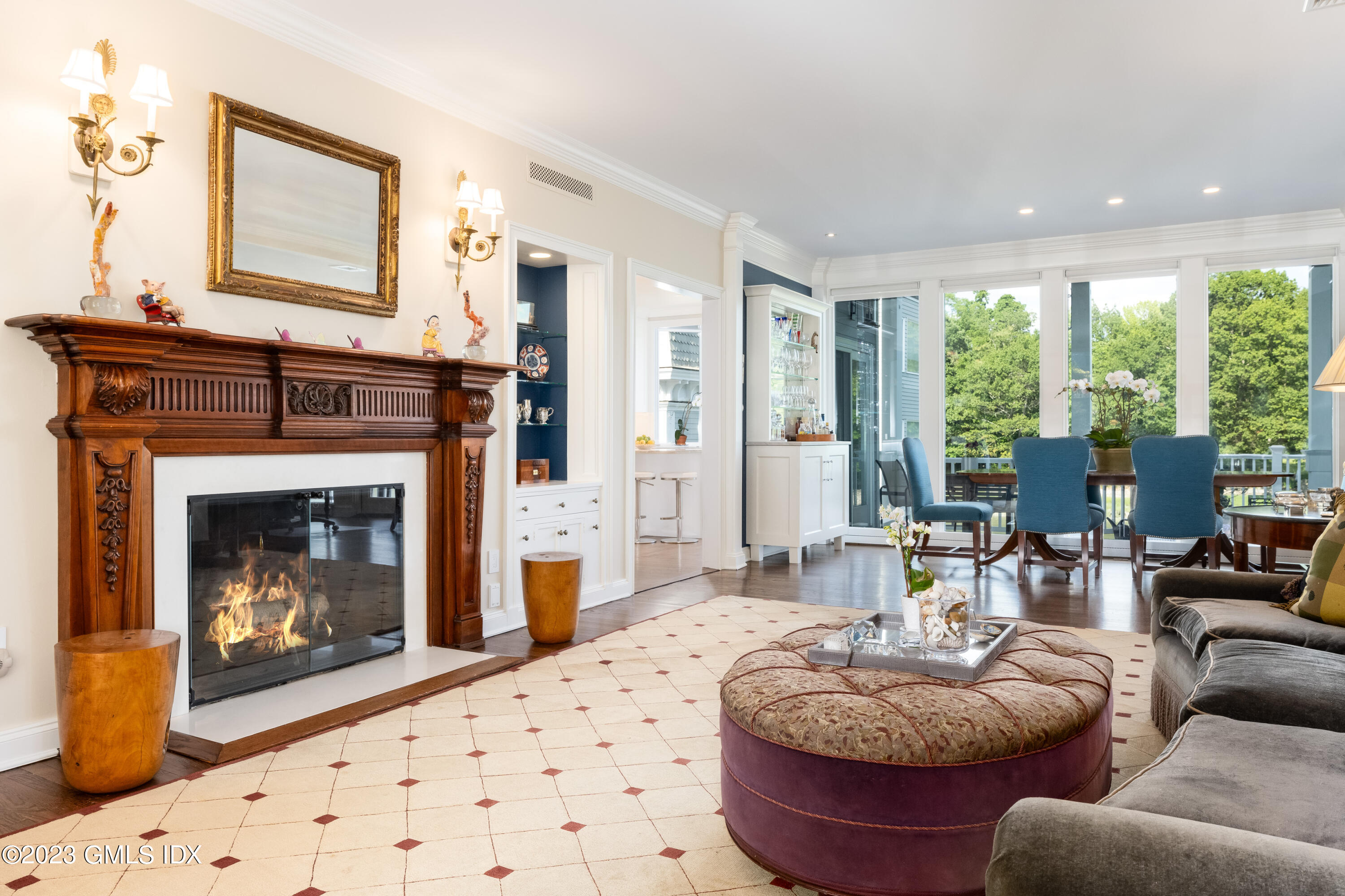 633 Steamboat Road, Unit 2 Greenwich, CT 06830 - Photo 12 of 27 a living room with furniture and a fireplace
