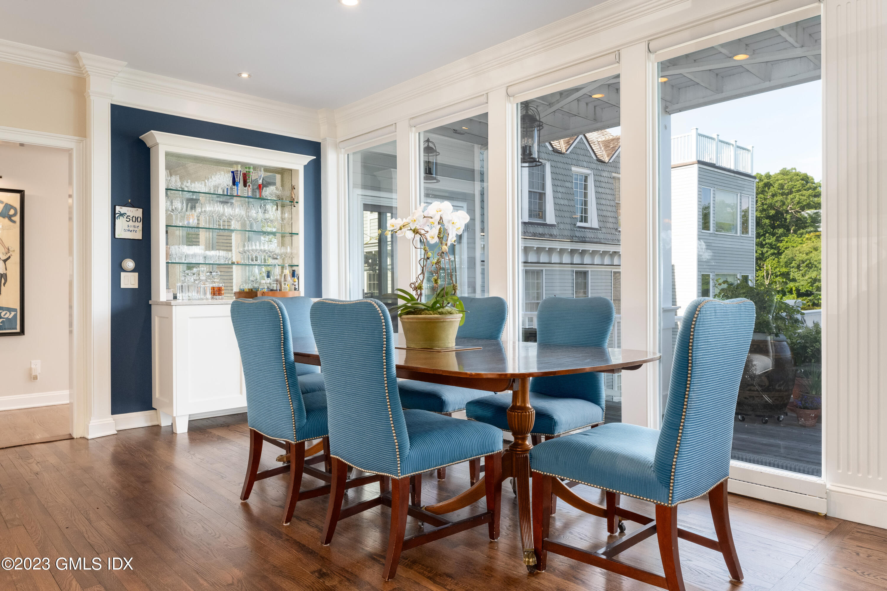 633 Steamboat Road, Unit 2 Greenwich, CT 06830 - Photo 14 of 27 a view of a dining room with furniture window and wooden floor