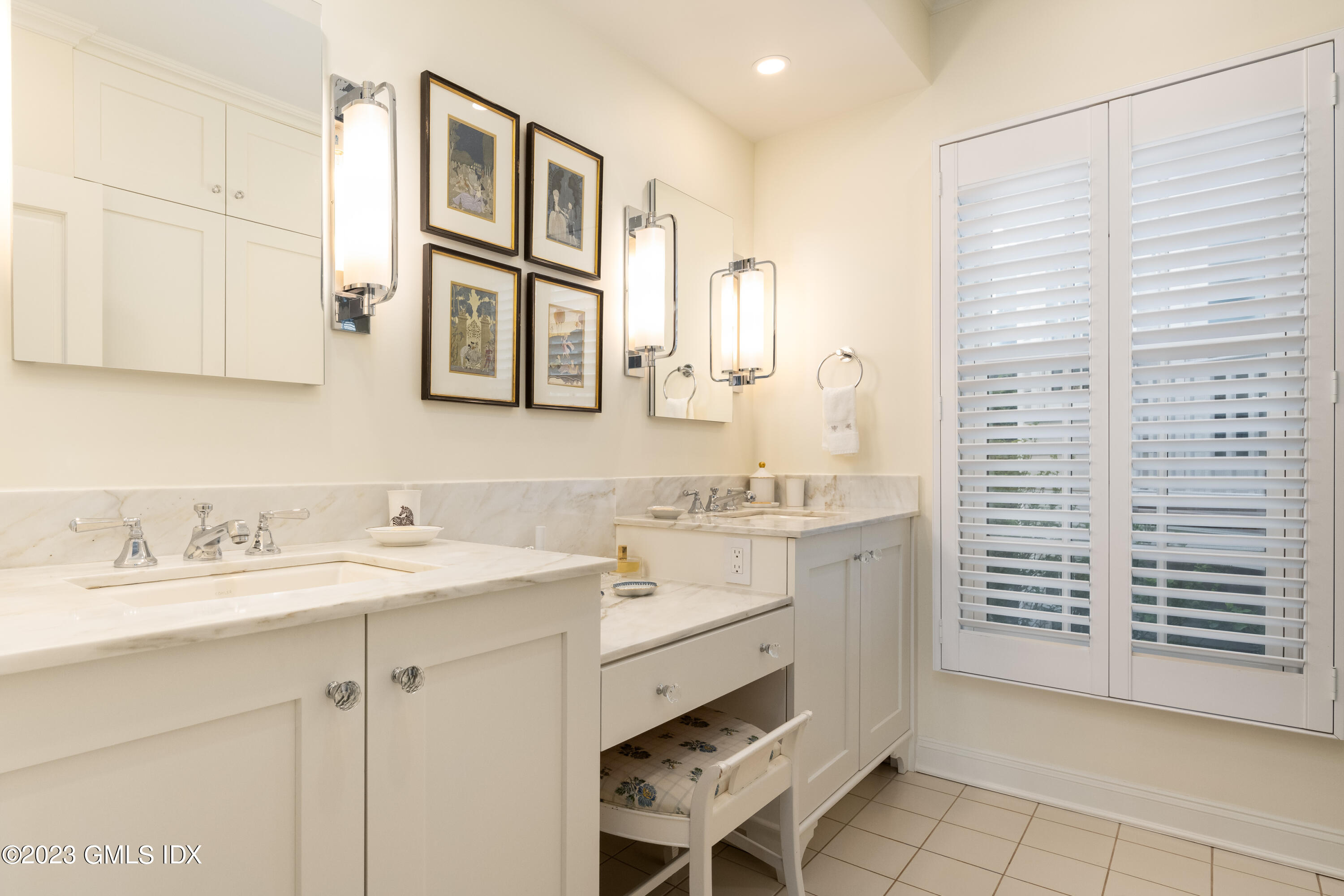 633 Steamboat Road, Unit 2 Greenwich, CT 06830 - Photo 21 of 27 a bathroom with a sink double vanity and a mirror