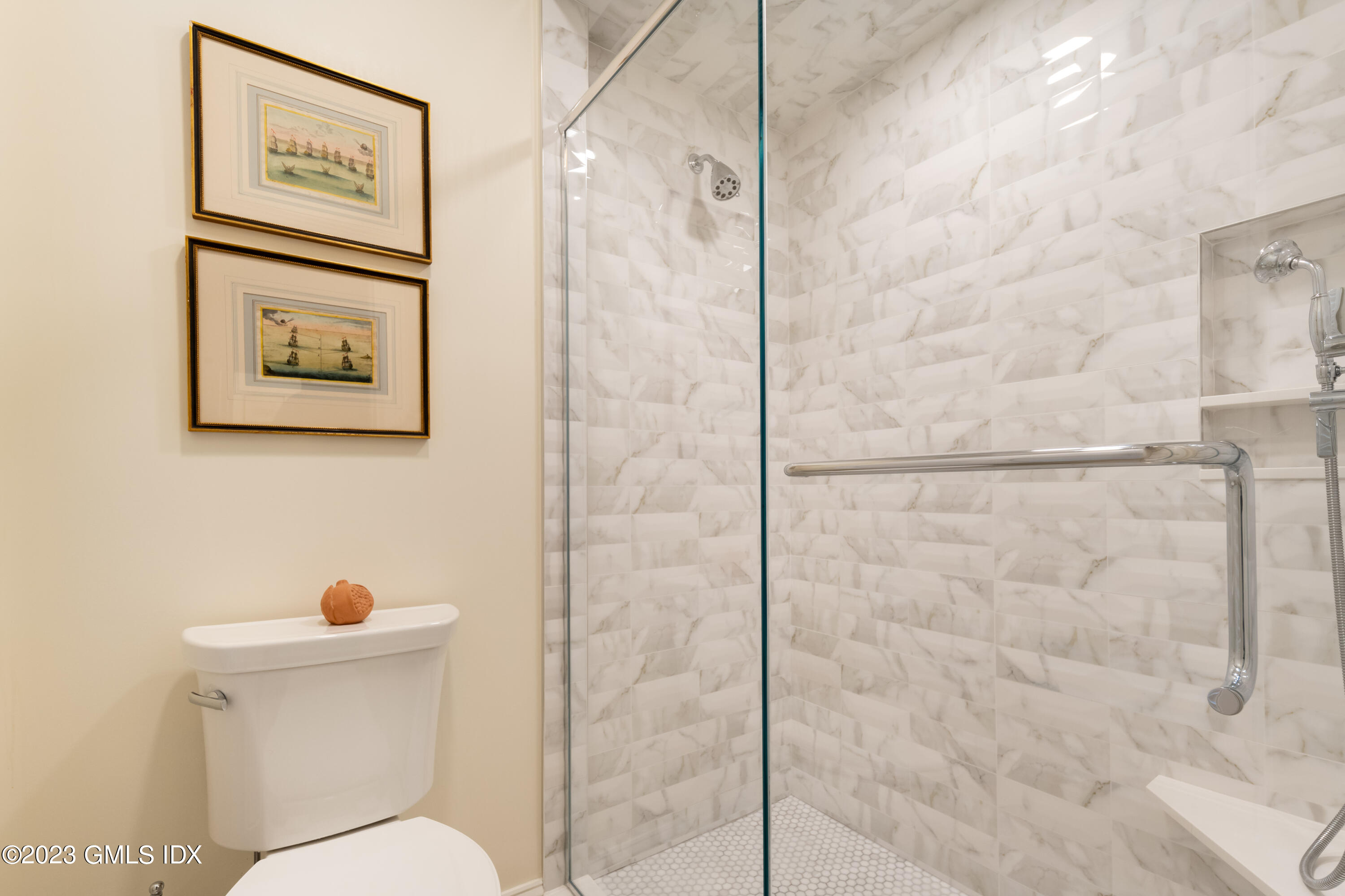 633 Steamboat Road, Unit 2 Greenwich, CT 06830 - Photo 22 of 27 a bathroom with a toilet and a shower