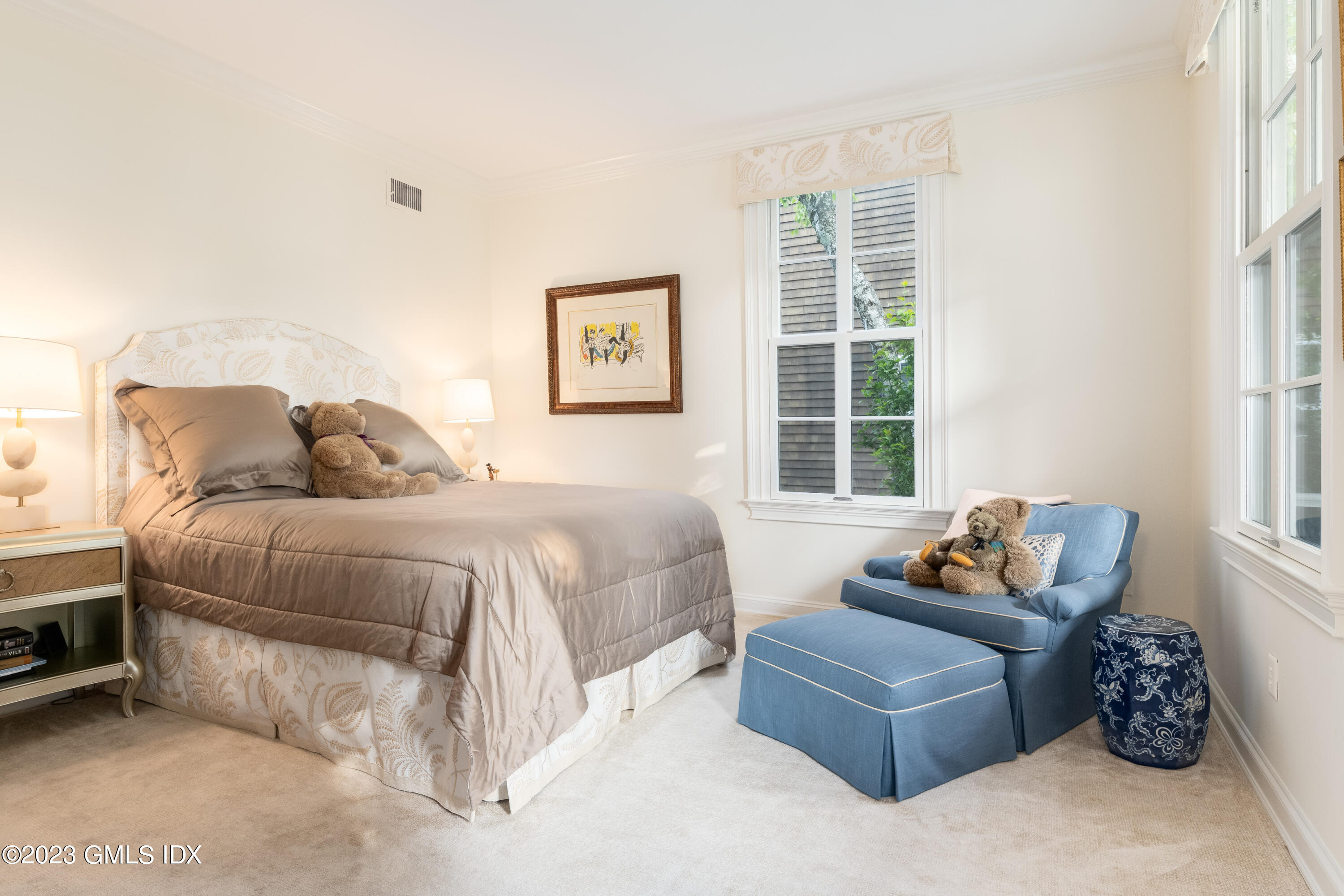 633 Steamboat Road, Unit 2 Greenwich, CT 06830 - Photo 24 of 27 a bedroom with a bed and a couch