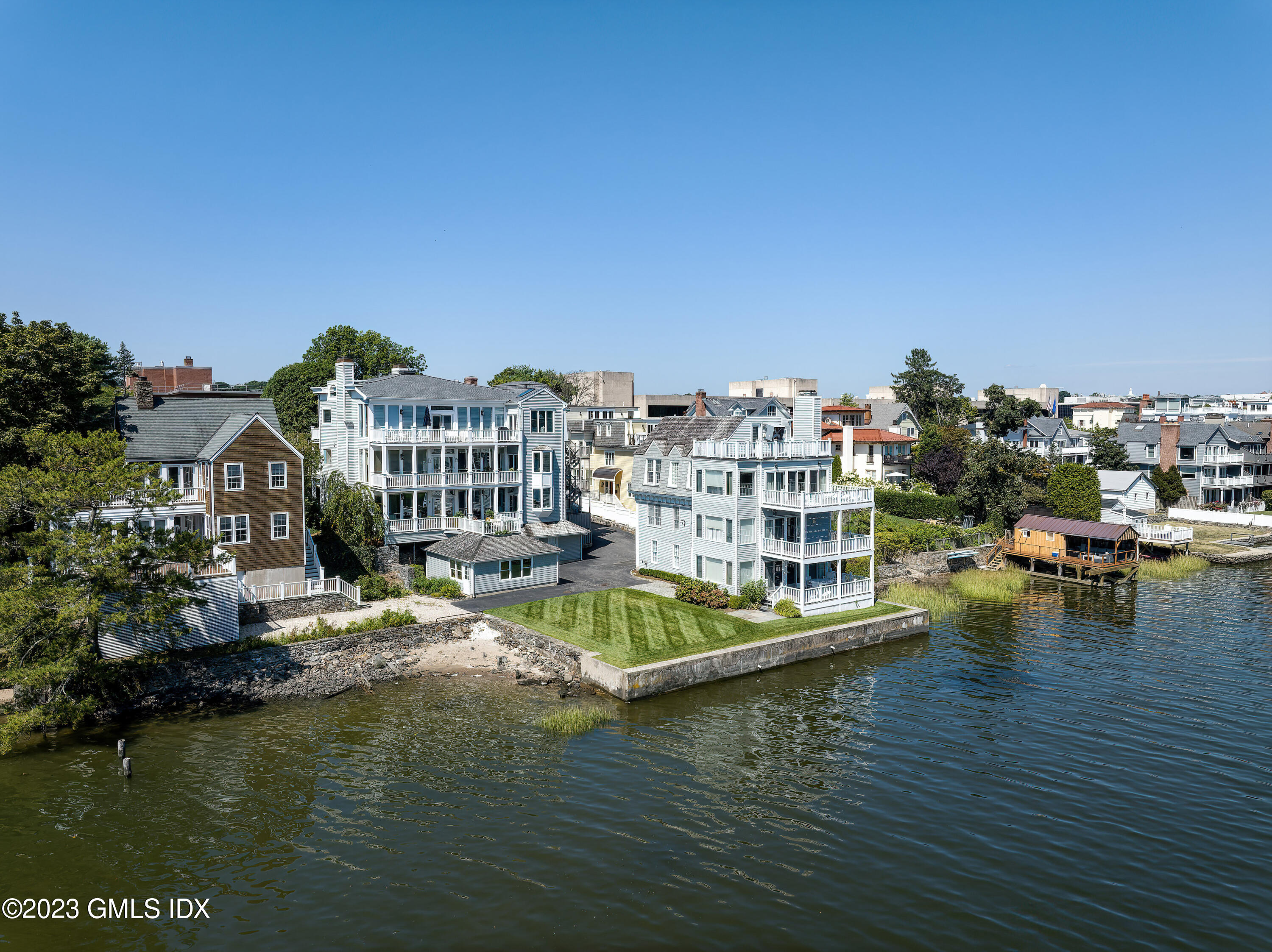 633 Steamboat Road, Unit 2 Greenwich, CT 06830 - Photo 6 of 27 a view of a lake with houses