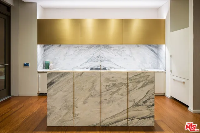 a view of workspace with furniture and air hockey table