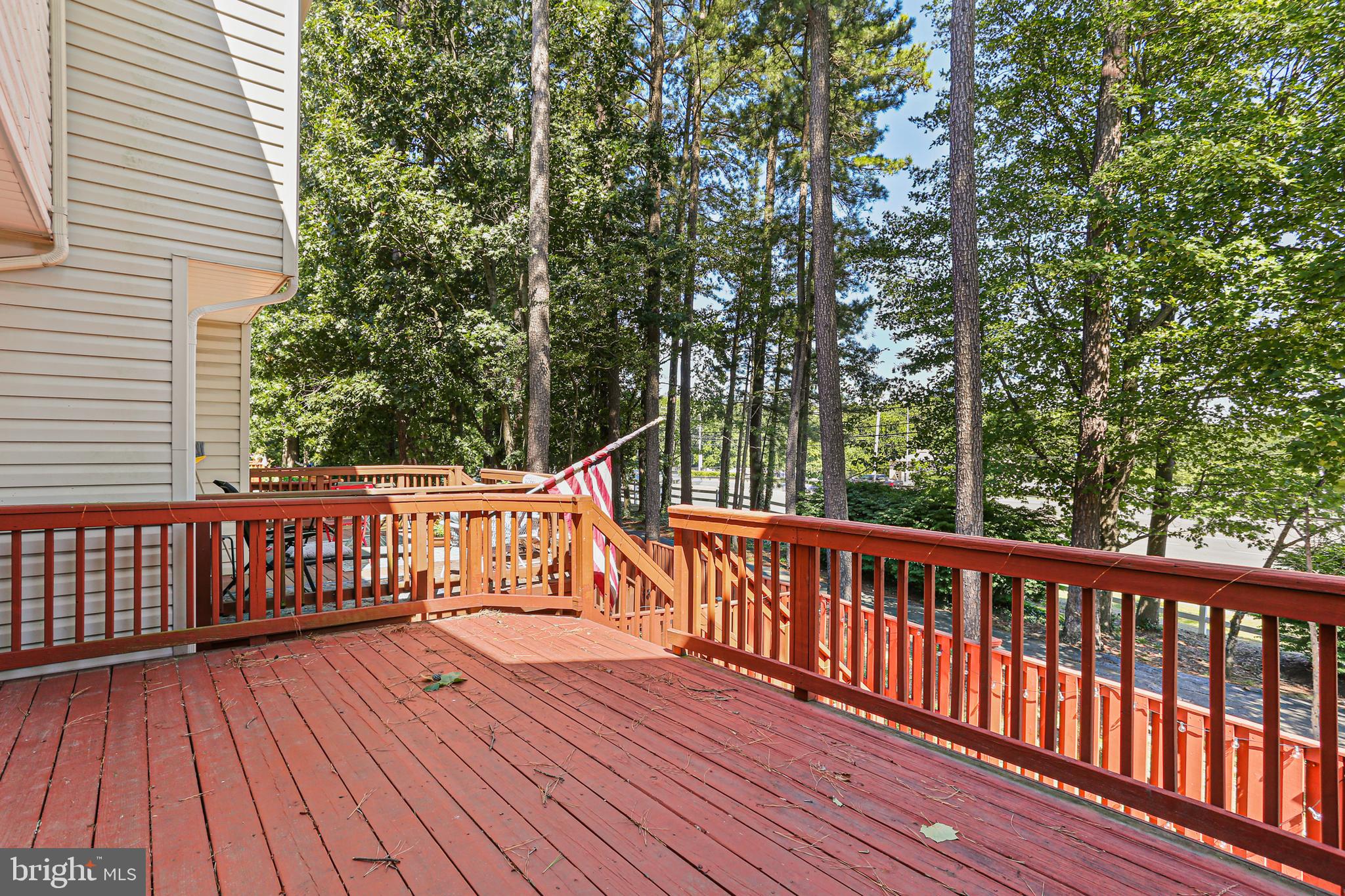 662 Howards Loop Annapolis, MD 21401 - Photo 25 of 29 a view of balcony with wooden floor and fence