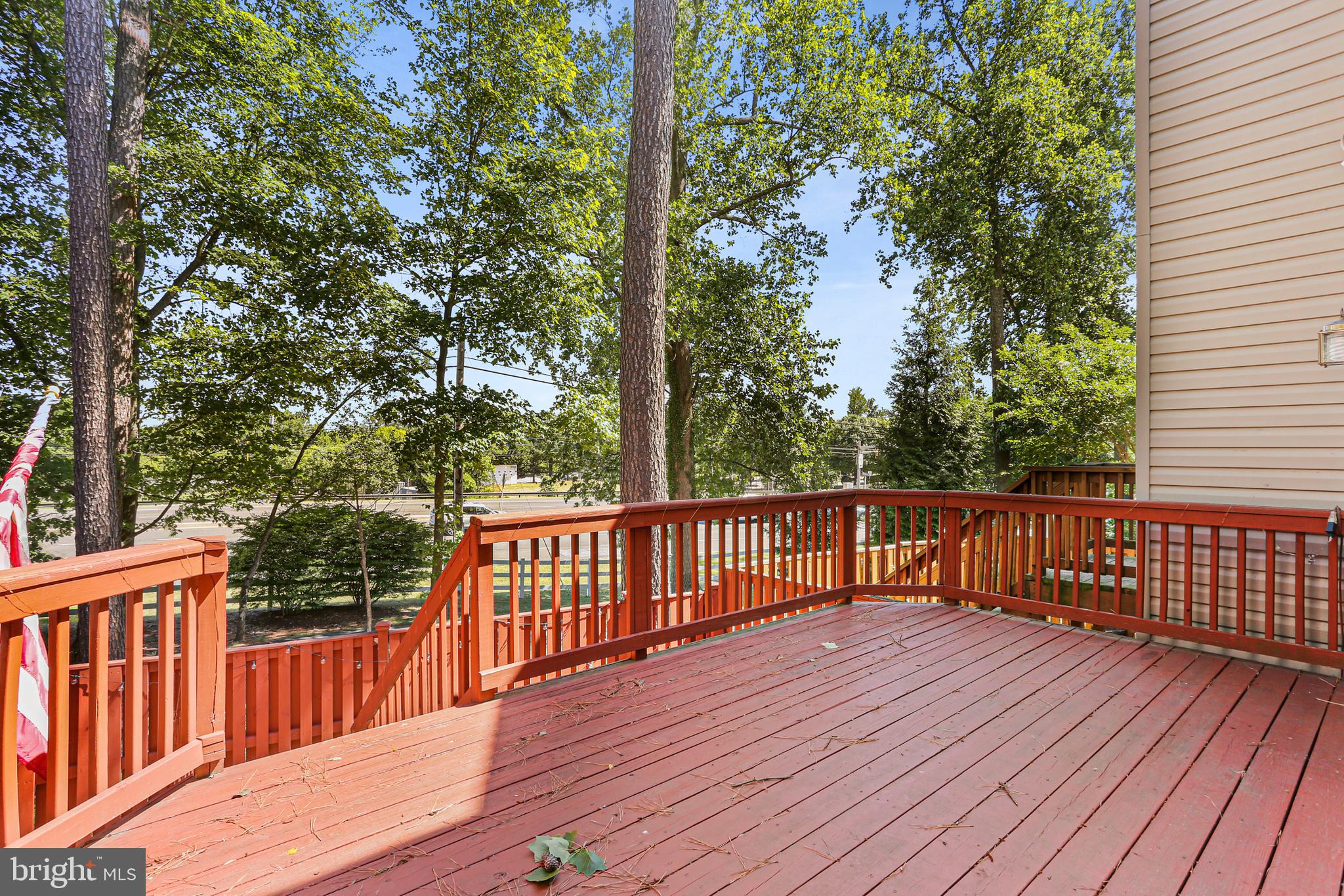 662 Howards Loop Annapolis, MD 21401 - Photo 26 of 29 a view of balcony with wooden floor and fence